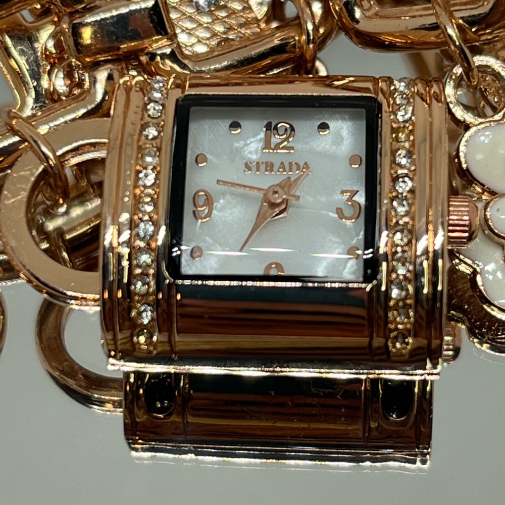 STRADA a beautiful, rose tone, charm bracelet, watch! Size 7